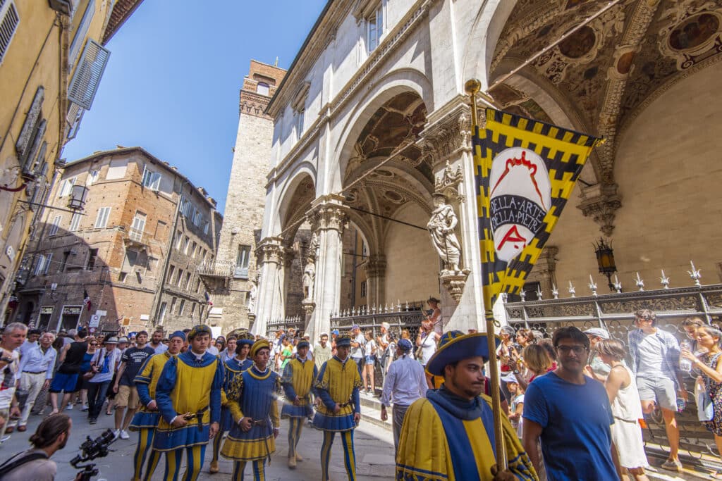 Parade with people wearing traditional and historical clothes